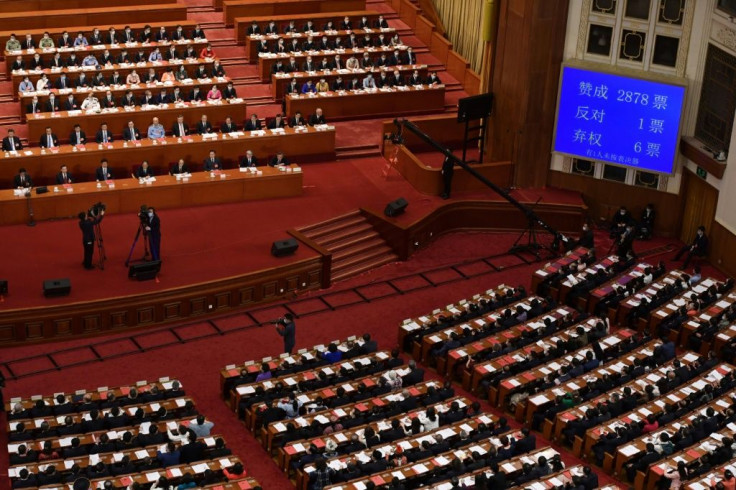 A screen shows the result of the vote on a proposal to draft a security law on Hong Kong during the closing session of the National People's Congress at the Great Hall of the People in Beijing