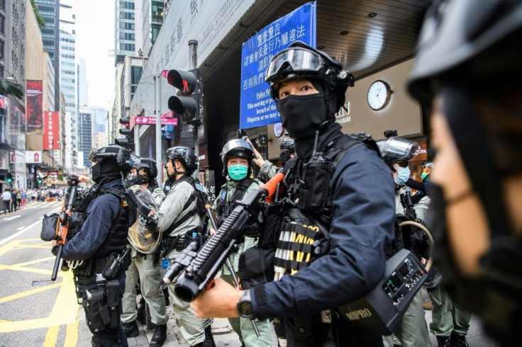Riot police in Hong Kong have arreatsed hundreds of people in recent days to ensure there are no widespread protests