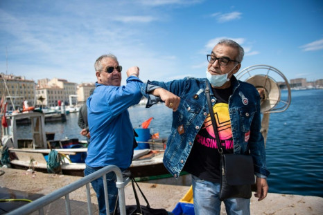 "People from the south need contact," a Marseille walking tour guide says