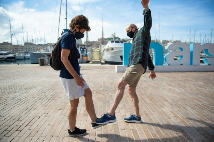 People do the "Wuhan shake" in Marseilles, southern France.