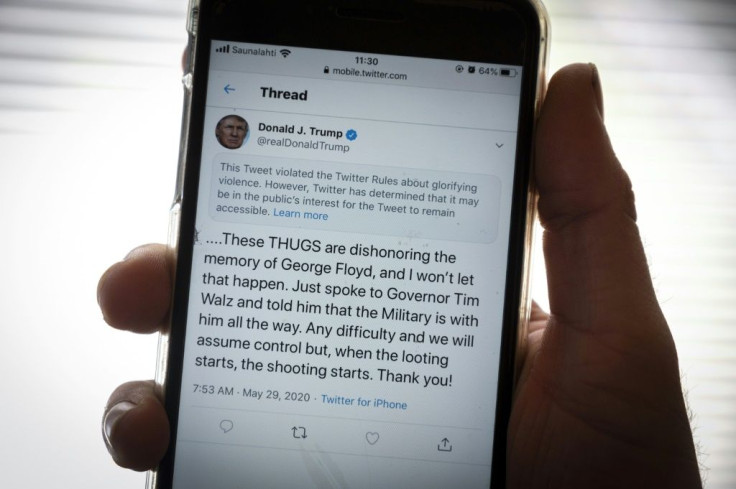 Twitter slapped a warning label on a tweet from President Donald Trump and a similar one from the White House which the company said violated its policy of  "glorifying violence"