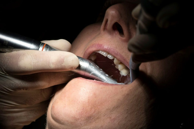 Many dentists were forced to close in Britain because of the coronavirus epidemic, and some patients had to then give themselves a helping hand