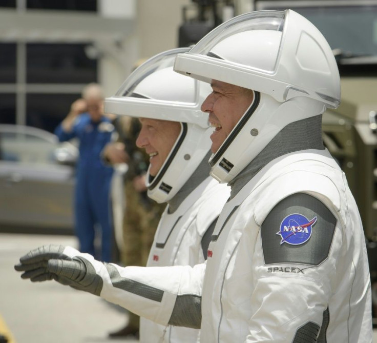 NASA astronauts Douglas Hurley, left, and Robert Behnken, right
