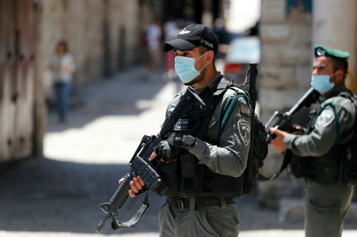 Israeli security forces patrol the area after the shooting