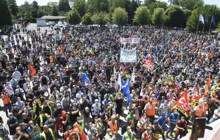 Unions said 8,000 people took part in the protest over the cuts designed to help Renault steer out of a cash crunch exacerbated by the coronavirus pandemic