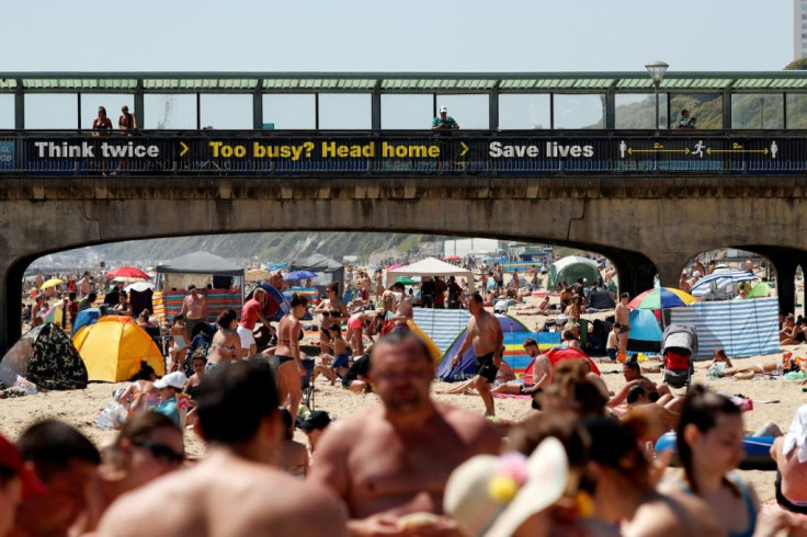 Britons revelled in soaring temperatures by flocking to beaches and parks ahead of a further easing of lockdown measures