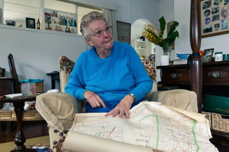 Isobel Simons, 80, points shows the boundaries of her former farm in Mvurwi, which was repossessed during Zimbabwe's land reform