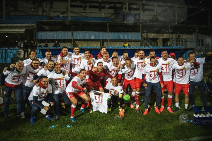 Red Star Belgrade players celebrate their third Serbian league title in a row