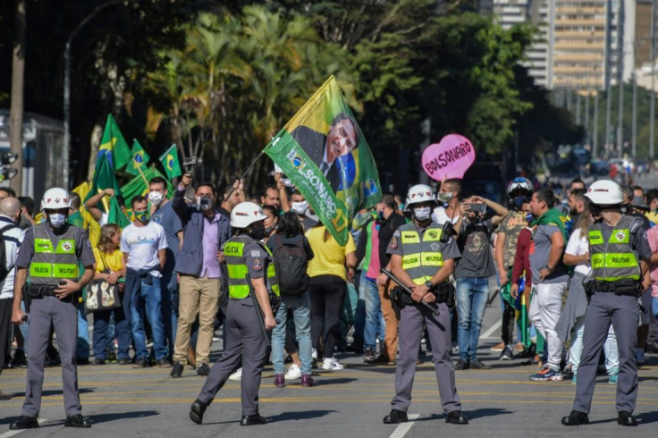 With more than half a million known infections, Brazil has the second-highest caseload in the world, but President Jair Bolsonaro again defied social distancing recommendations to meet supporters