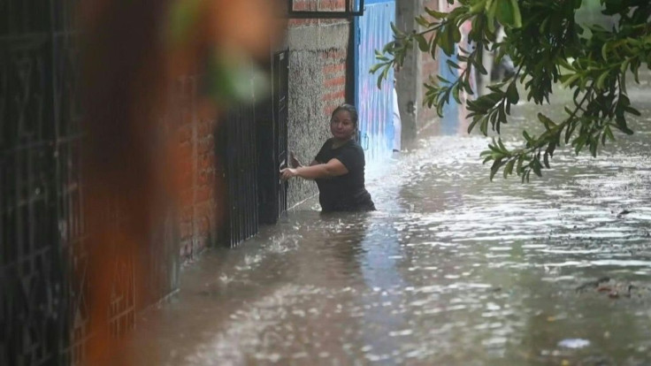 Tropical storm Amanda, the first named storm of the season in the Pacific, has flooded entire neighbourhoods in El Salvador, destroying houses and forcing dozens of residents to be evacuated.