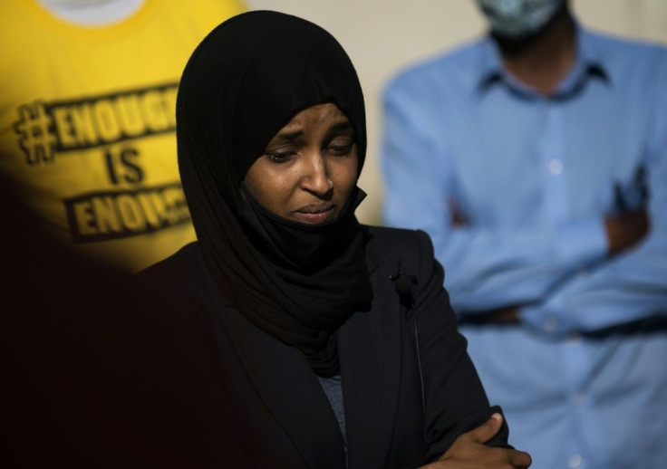 President Donald Trump told Representative Ilhan Omar, pictured,  and three other women of color in Congress that they should "go back" to their countries of origin