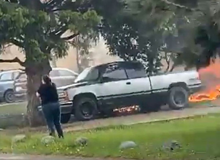 A screengrab taken from a video obtained from the Facebook account of Jason Kyle Arnold shows a fire burning after a plane from Canada's Snowbirds, an elite air force aerobatics team, crashed on May 17, 2020 in Kamloops, British Columbia