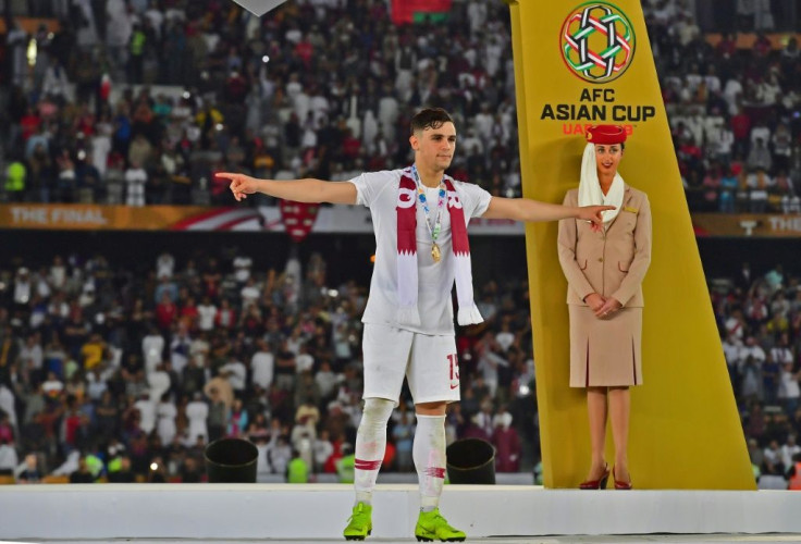 Qatar's defender Bassam al-Rawi celebrating his team's win over Japan during the 2019 AFC Asian Cup final football match in Abu Dhabi