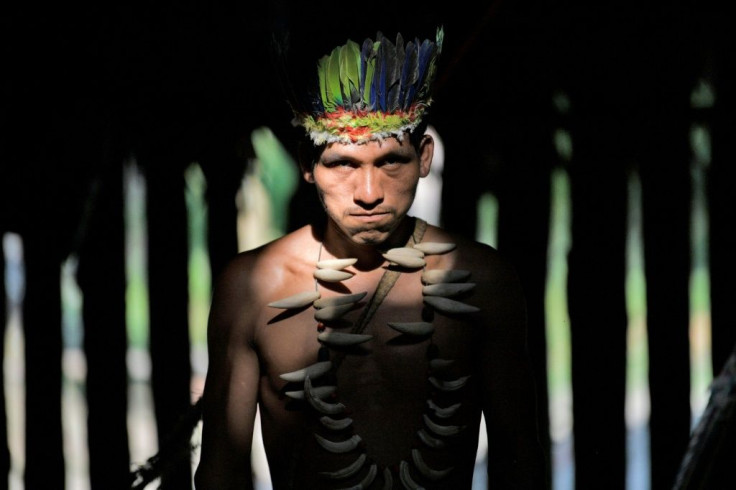 A Colombian Huitoto indigenous man. A mounting body of evidence suggests that legal recognition of indigenous land rights provides greater forest protection