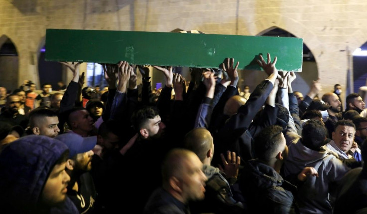 Thousands of mourners attended the funeral of Iyad Hallak