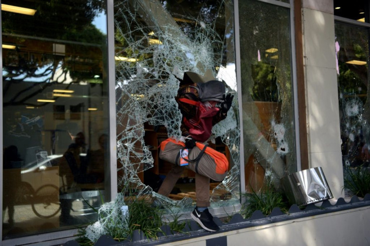 Protesters loot shops in Santa Monica, California, on May 31, 2020. The looting of the affluent neighborhood contrasts to previous race riots in LA, when mostly black poorer neighborhoods took the brunt of the violence