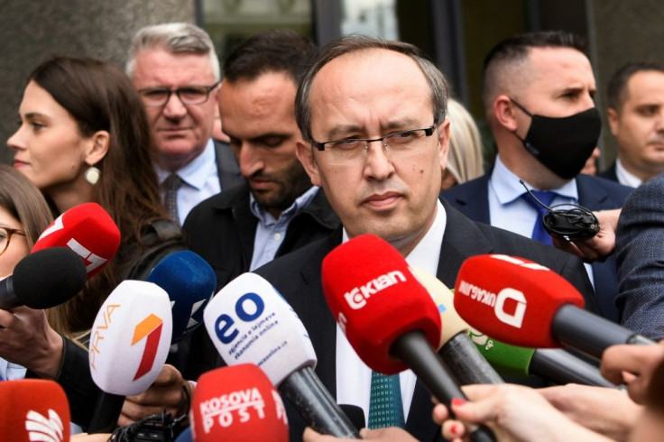 Avdullah Hoti speaks to the media in Pristina after emerging from parliament as the new prime minister of Kosovo