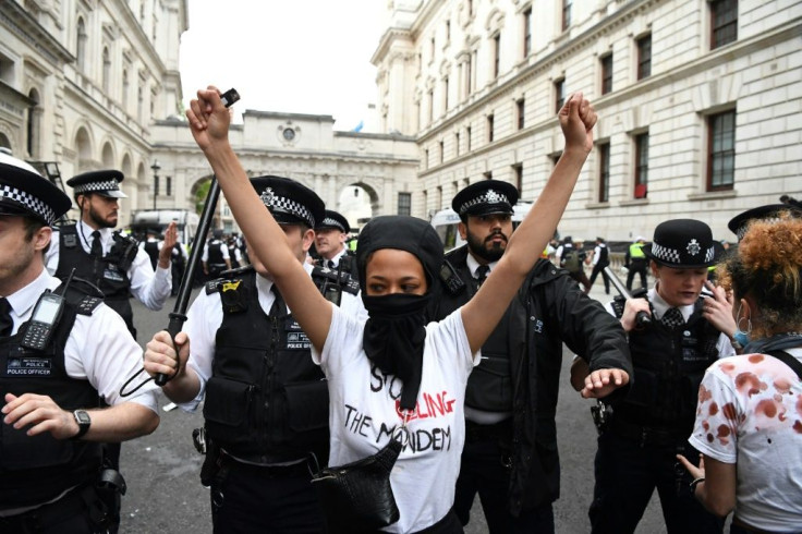 Protestors remonstrate with police officers during an anti-racism demonstration in London after George Floyd, an unarmed black man, died after a police officer knelt on his neck during an arrest in Minneapolis, USA.