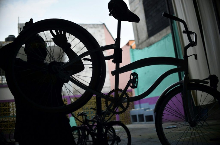 Activists at the Bicitekas organization repair and assemble bicycles to be donated to medical personnel in Mexico City