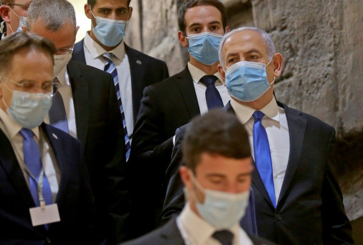 Israeli Prime Minister Benjamin Netanyahu arrives at the parliament building for the swearing-in of his new government last month
