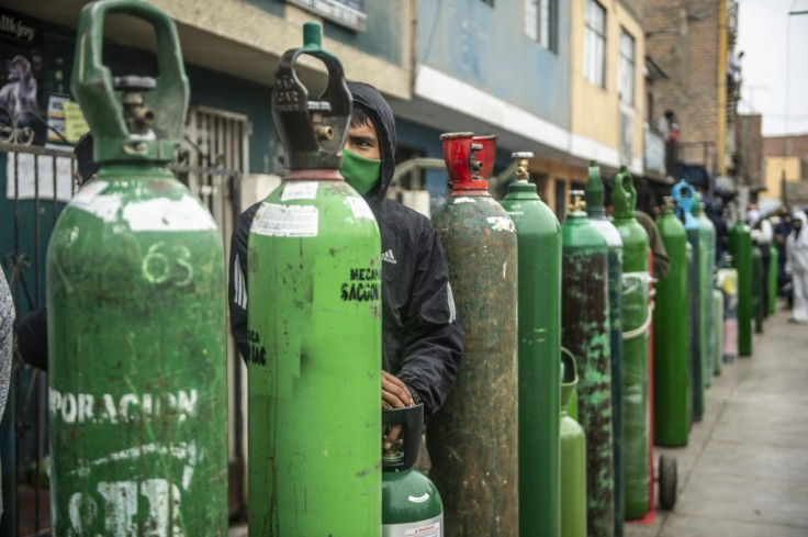 Desperate residents in Peru were lining up to buy oxygen tanks