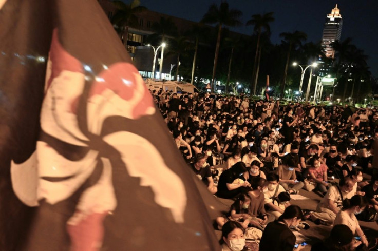 Hundreds attended an evening vigil in Taipei