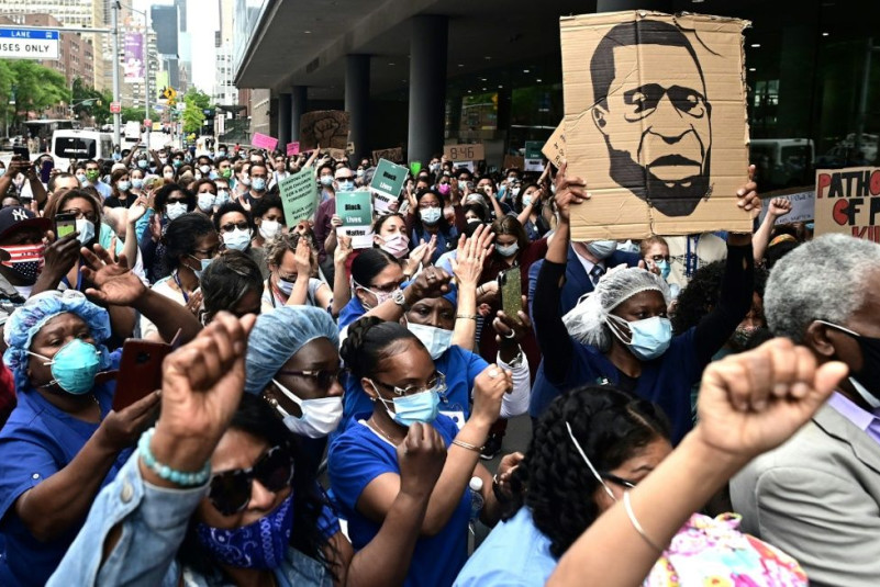 Nurses and healthcare workers attend a 'Black Lives Matter' rally in front of Bellevue Hospital on June 4, 2020, in New York City