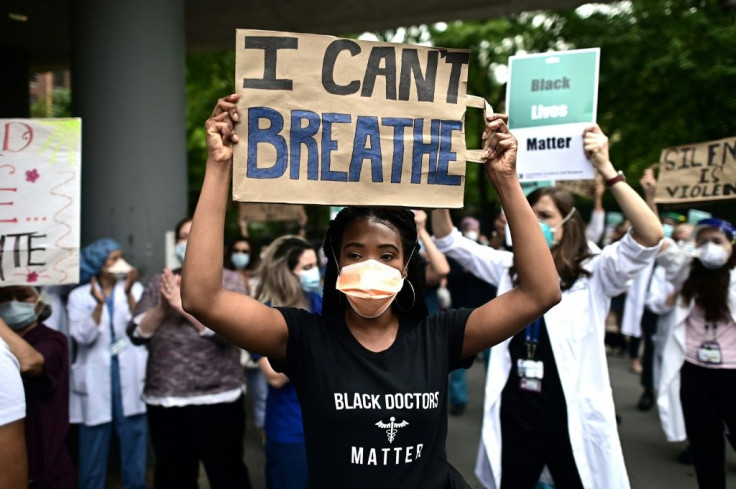 Nurses and healthcare workers attend a 'Black Lives Matter' rally in front of Bellevue Hospital on June 4, 2020, in New York City