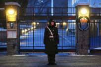 A paramilitary police officer stands guard outside the Swedish embassy in Beijing in 2019