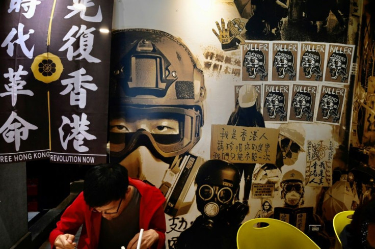 A man eats lunch at the Aegis, a Taipei restaurant started by a Hong Kong lawyer which helps Hongkongers who have left the city