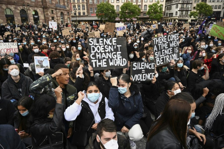 Several thousand youths dressed in black gathered in the eastern city of Strasbourg on Friday night to remember George Floyd