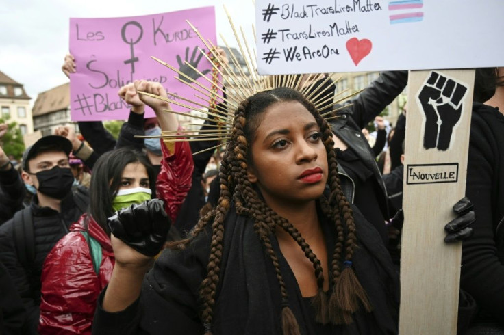 Protesters in Strasbourg chanted "The real virus is racism"