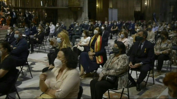 Hundreds mourn the dead at Seville mass for virus victims