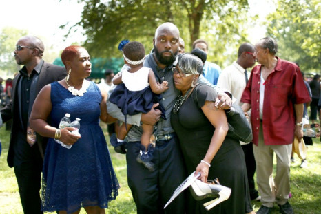 The father of Michael Brown, attending the funeral of his son who was killed by a police officer