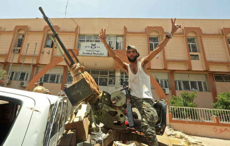 A fighter loyal to Libya's UN-recognised Government of National Accord in the recaptured town of Tarhuna on June 5