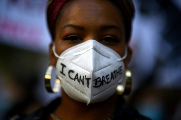 Thousands of protesters gathered outside the US embassy in Madrid