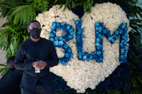 A 'Black Lives Matter' wreath, pictured as the casket of George Floyd arrives at the Fountain of Praise church in Houston