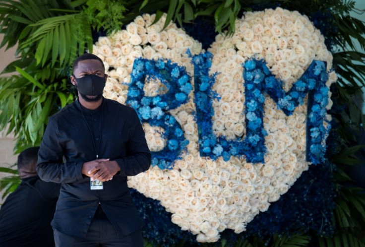 A 'Black Lives Matter' wreath, pictured as the casket of George Floyd arrives at the Fountain of Praise church in Houston