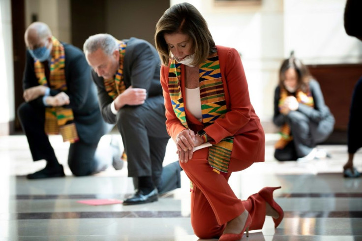 House Speaker Nancy Pelosi and other Democratic lawmakers take a knee to observe a moment of silence on Capitol Hill for George Floyd and other victims of police brutality