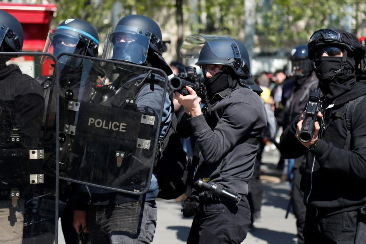 Two dozen people lost an eye in the 'yellow vest' riots  as police used rubber bullets to rein in the rallies, and five lost a hand to stun grenades(FILES) In this file photo taken on April 20, 2019 A police officer points a 40-millimetre rubber defensi