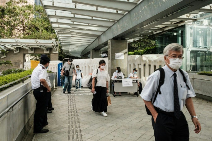 Barriers have been thrown up around Hong Kong's legislature, police stations, government ministries and Beijing's offices in the city