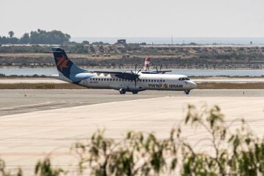 An Israir Airlines flight from Tel Aviv lands at Cyprus's Larnaca International Airport, the first scheduled commercial passenger flight to arrive on the island since the imposition of a coronavirus lockdown on March 21