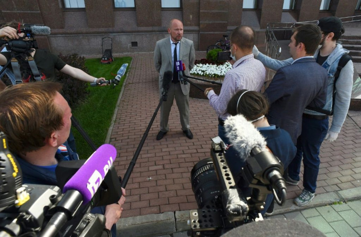 Sokolov's lawyer Alexander Pochuyev speaks to the media