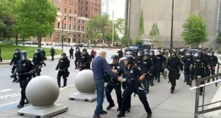In this still image courtesy of National Public Radio (NPR) television station WBFO and taken by Mike Desmond, Buffalo, New York, police shove a 75-year-old protester to the ground on June 4, 2020