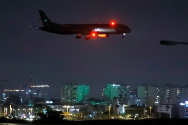 A cargo plane operated by Etihad Airways carrying medical aid to help Palestinians cope with the coronavirus pandemic  prepares to land at Israel's Ben Gurion Airport near Tel Aviv on June 9, 2020