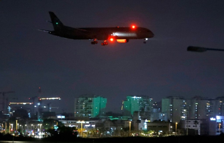 A cargo plane operated by Etihad Airways carrying medical aid to help Palestinians cope with the coronavirus pandemic  prepares to land at Israel's Ben Gurion Airport near Tel Aviv on June 9, 2020
