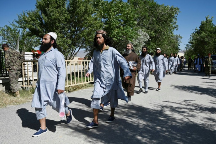Taliban prisoners prepare for their release from Bagram prison in Afghanistan