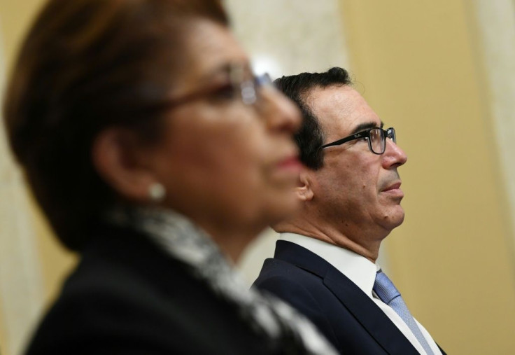 US Treasury Secretary Steven Mnuchin (right) waits to testify before the Senate Small Business and Entrepreneurship committee to examine the CARES Act in Washington on June 10, 2020