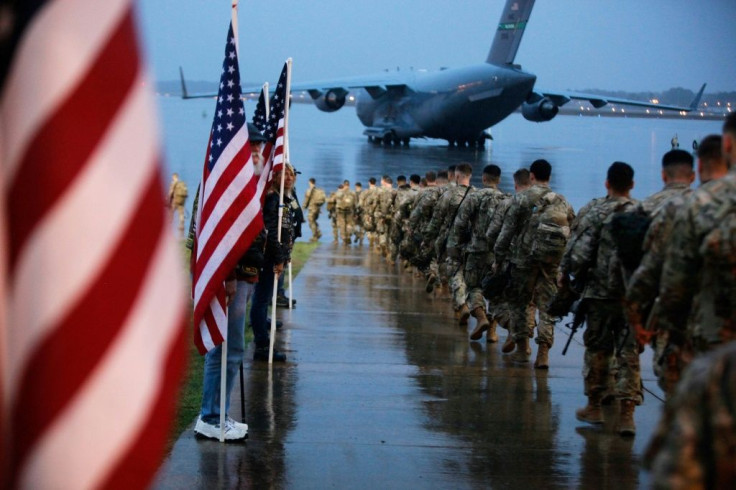 Paratroopers board an aircraft at Fort Bragg on January 4, 2020. The fort is one of many named after US Confederate generals that has come under scrutiny in the wake of anti-racism protests