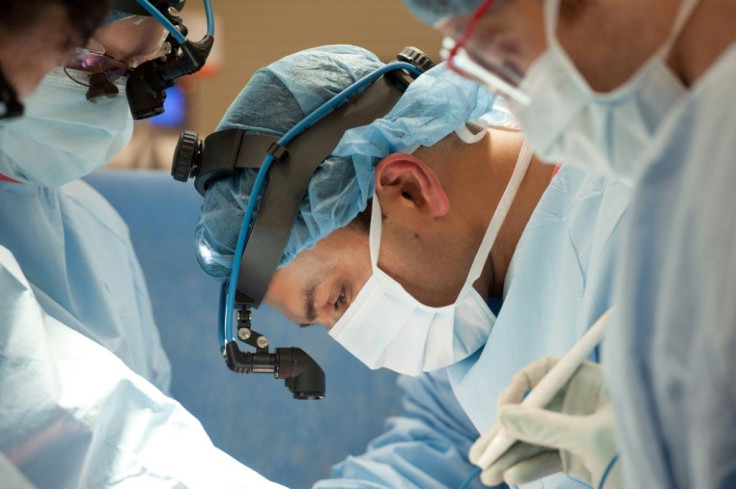 This image released by Northwestern Medicine, shows transplant surgeon, Ankit Bharat, at Northwestern Memorial Hospital in Chicago, where surgeons have performed a double-lung transplant on a COVID-19 patient